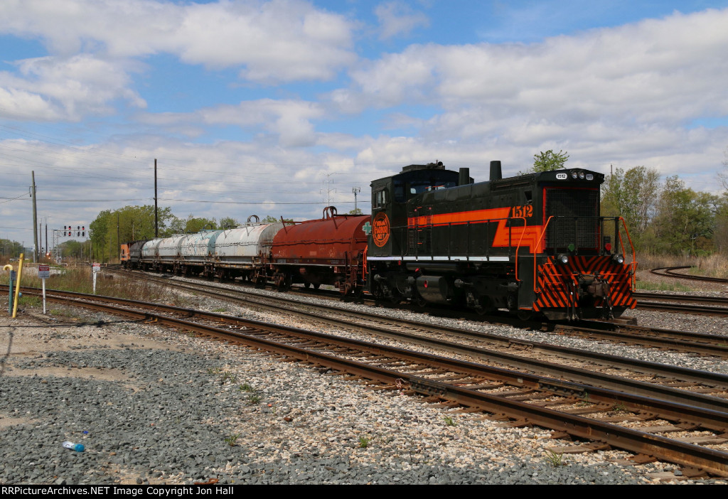 In fresh retro paint, IHB 1512 heads away with a local job